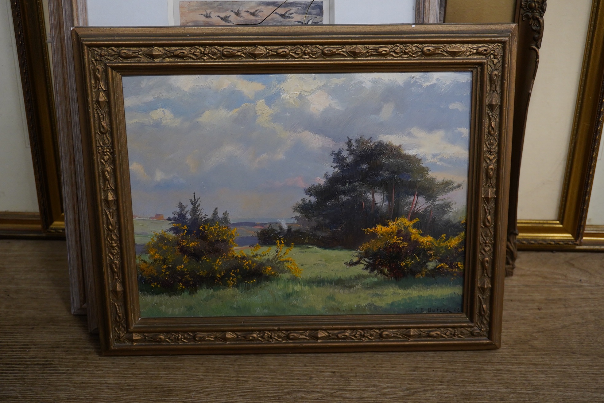 Charles Ernest Butler (1864–1933), oil on board, Gorse landscape, signed and dated '02, 21.5 x 29cm, gilt framed. Condition - good